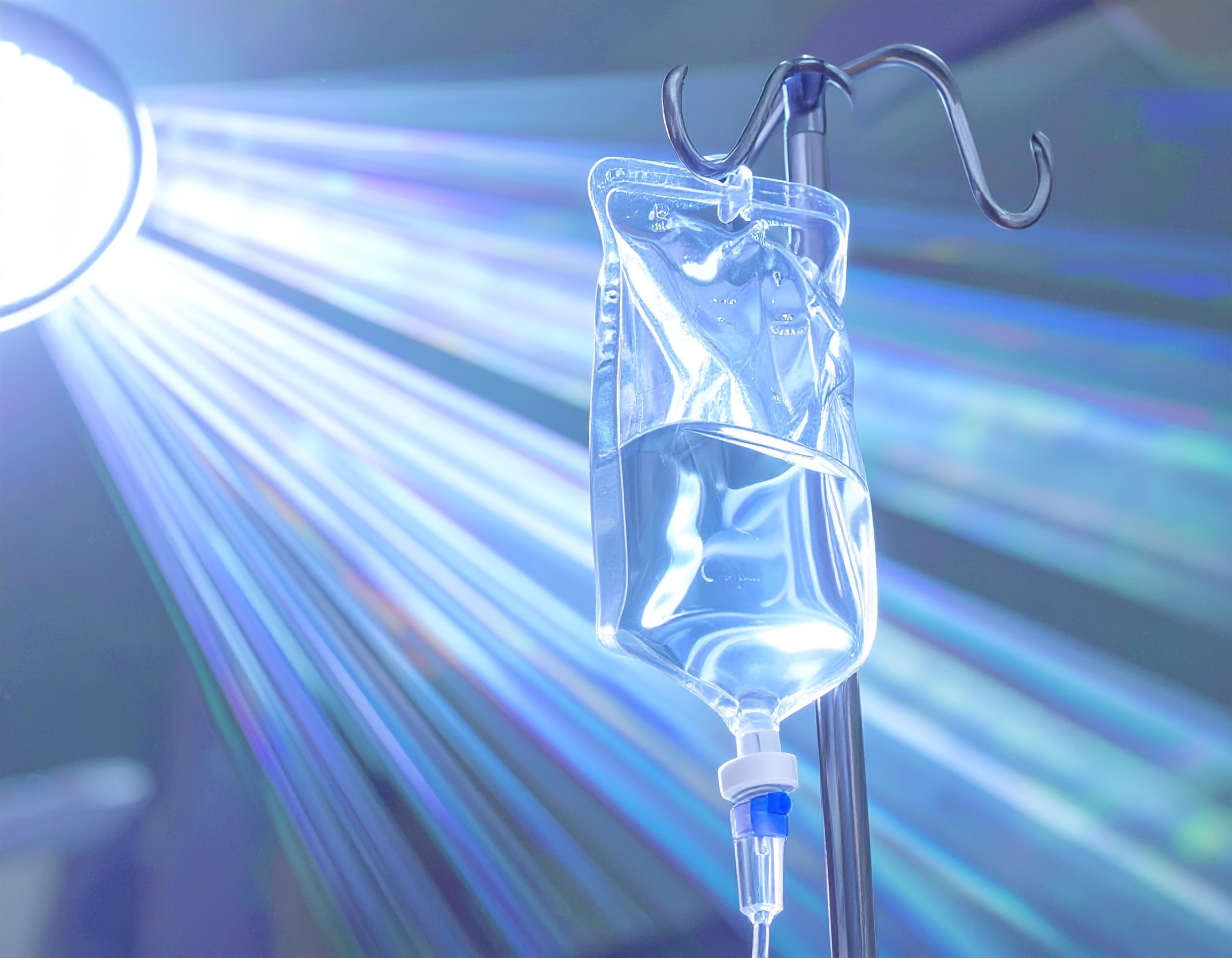 Firefly_An IV drip on top of an IV pole containing water that radiates a divine light 515676