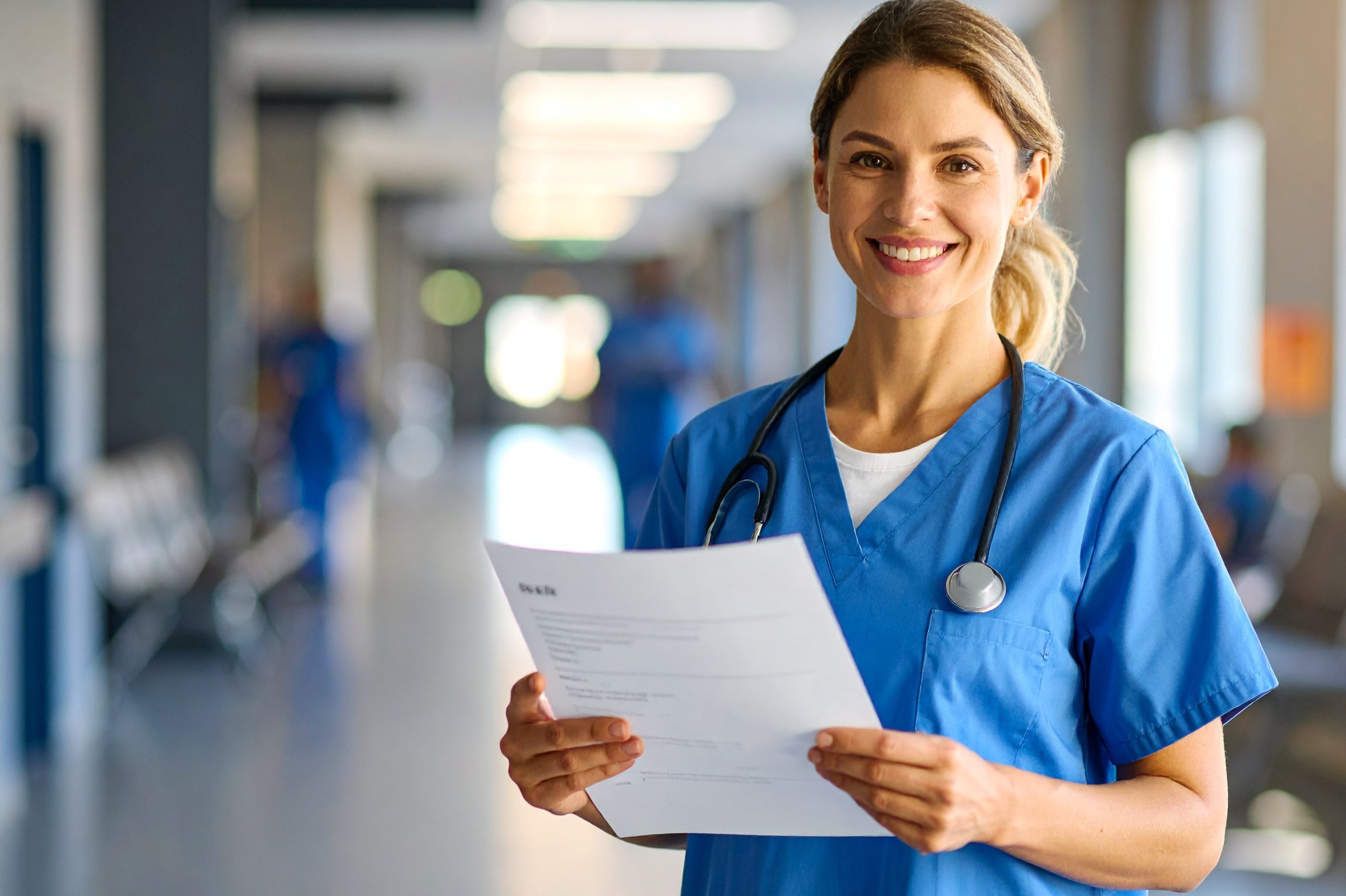 cropped-Firefly_Young-nurse-holds-her-resume-in-her-hand-with-a-hopeful-look-in-an-hospital-setting-930415.jpg